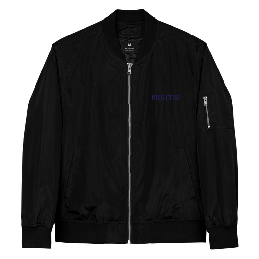 Black bomber jacket with blue MISITIS™ logo on chest and quote printed on back.