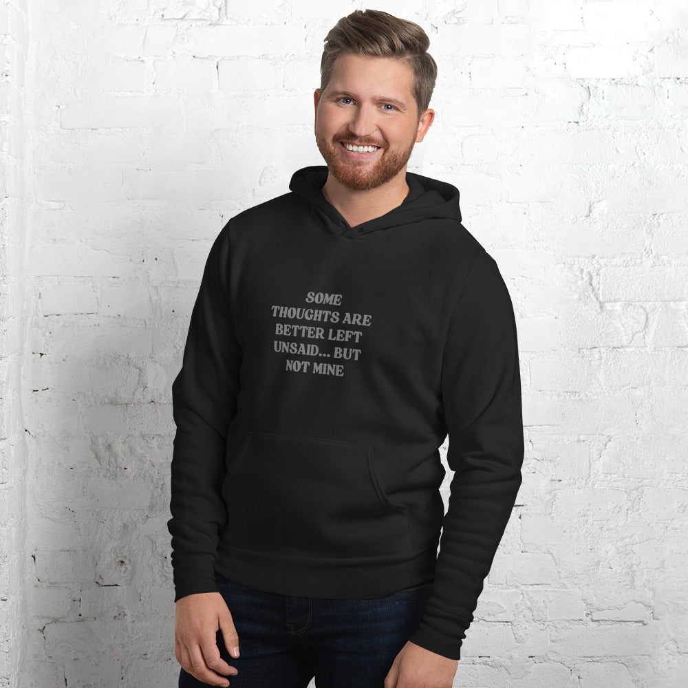 Black hoodie with bold white text that reads “Some thoughts are better left unsaid... but not mine.”
