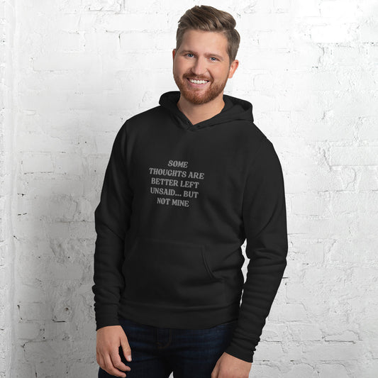 Black hoodie with bold white text that reads “Some thoughts are better left unsaid... but not mine.”
