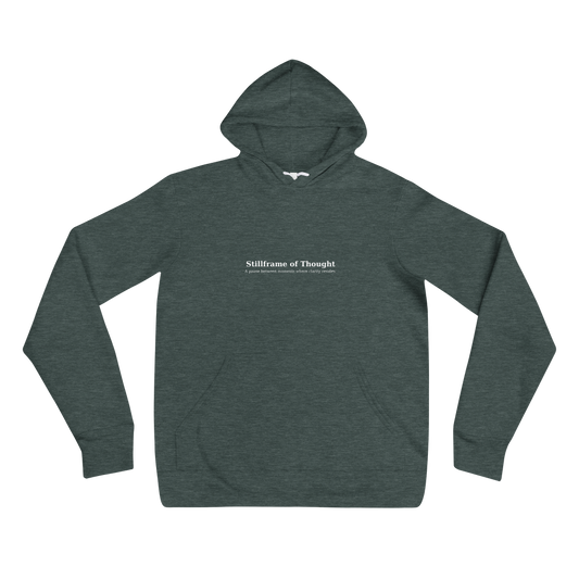 Sage green hoodie with white printed quote "Stillframe of Thought" on chest, front view.