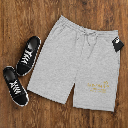 Men’s grey fleece shorts with gold SKIVENATOR™ emblem, side pockets, and relaxed fit – part of the limited-edition Cosmic Originals collection.