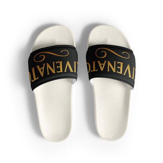 Black SKIVENATOR™ men’s slides with bold gold lettering across the strap