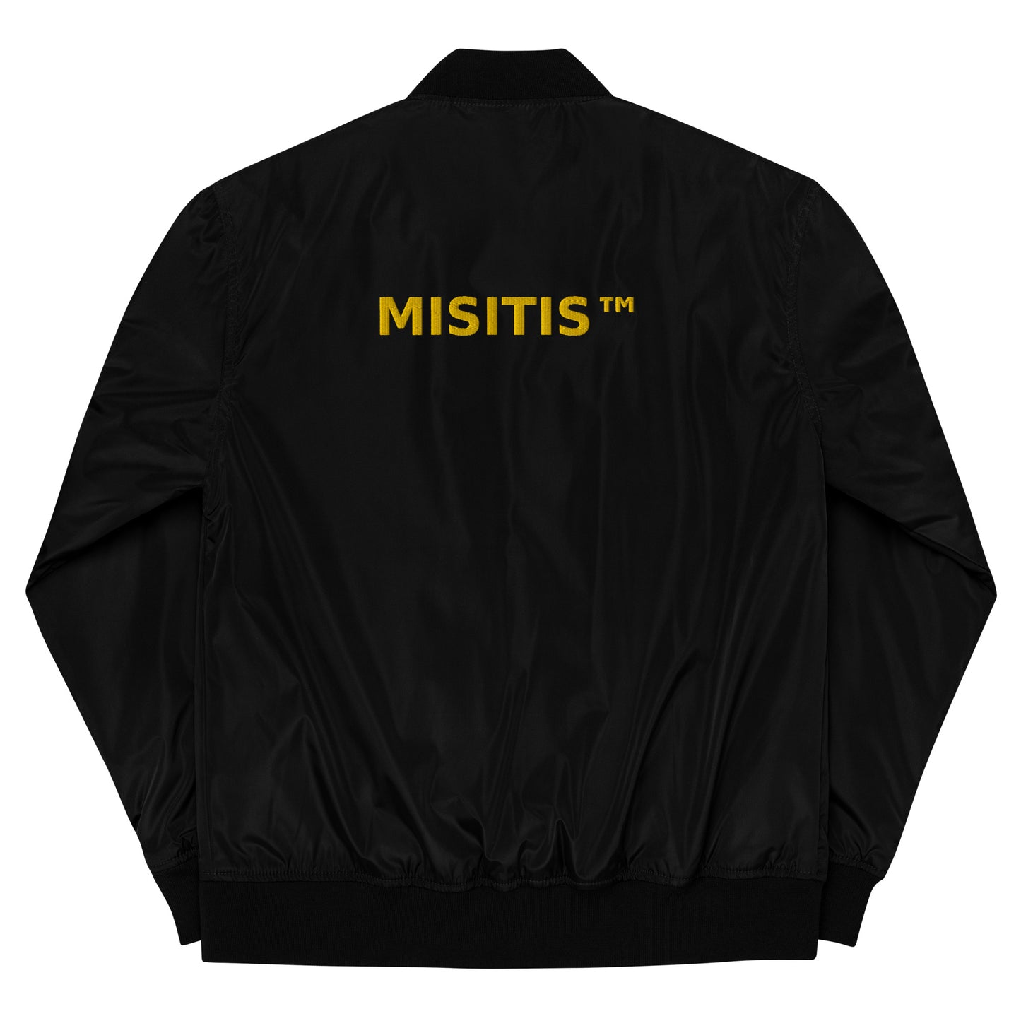 Black bomber jacket with “MISITIS™” printed in bold yellow text across the upper back, displayed flat on a white background.